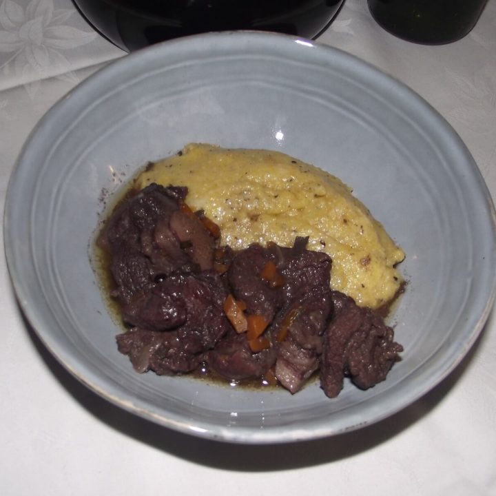 Braised wild boar with polenta taragna